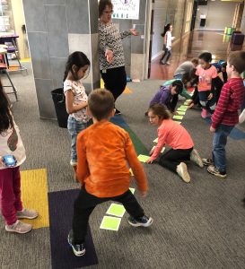 Students at CAL Elementary using the Sphero Indi straight track